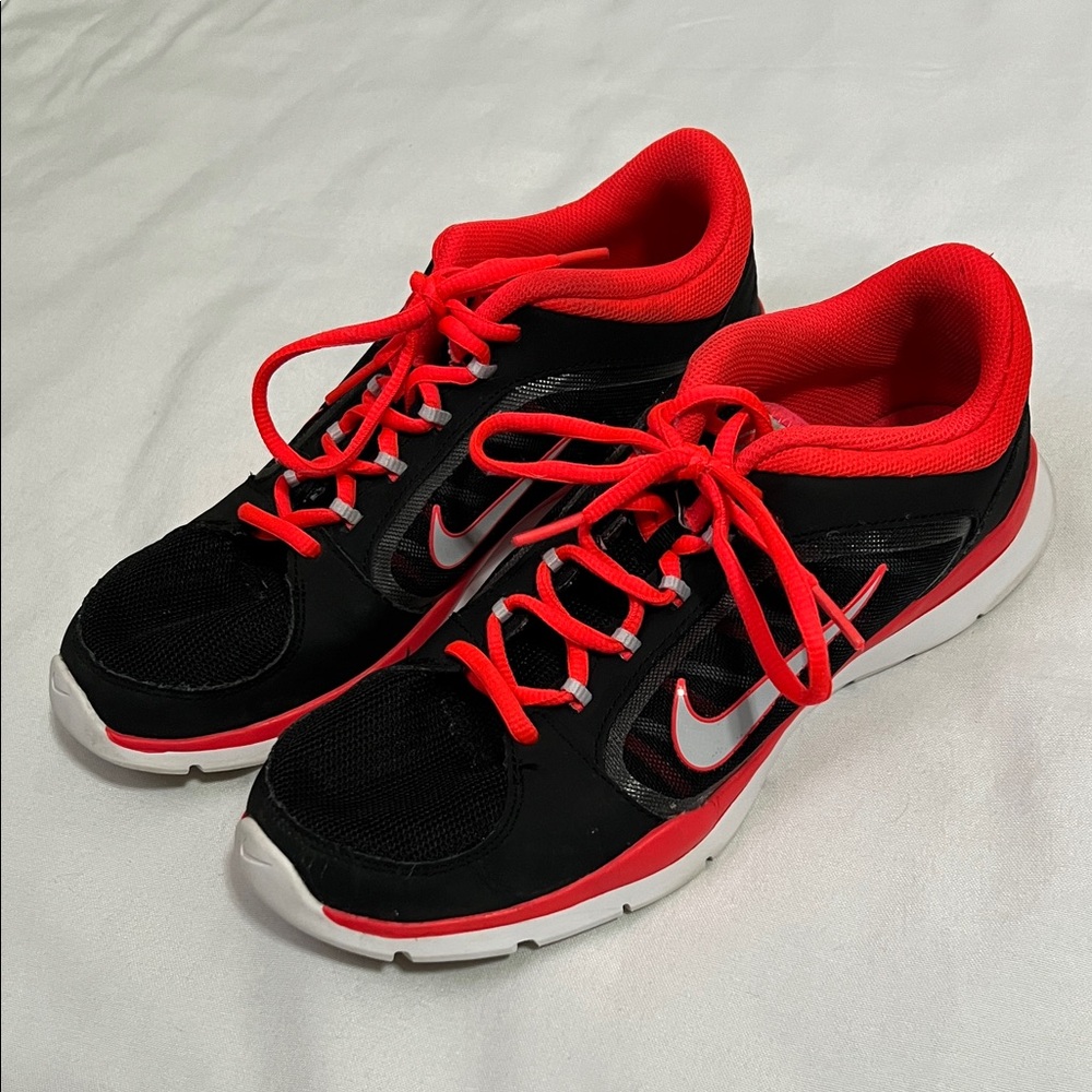 Nike Black Athletic Shoes with Bright Red Accents
